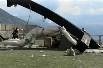 The 30-metre high wooden cross toppled over during an event near the Alpine village of Cevo.
